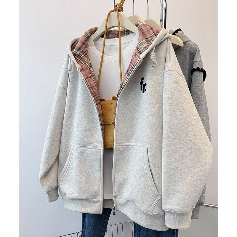 ملابس نسائية سweater هودي بتصميم فضفاض مع زر معدني...